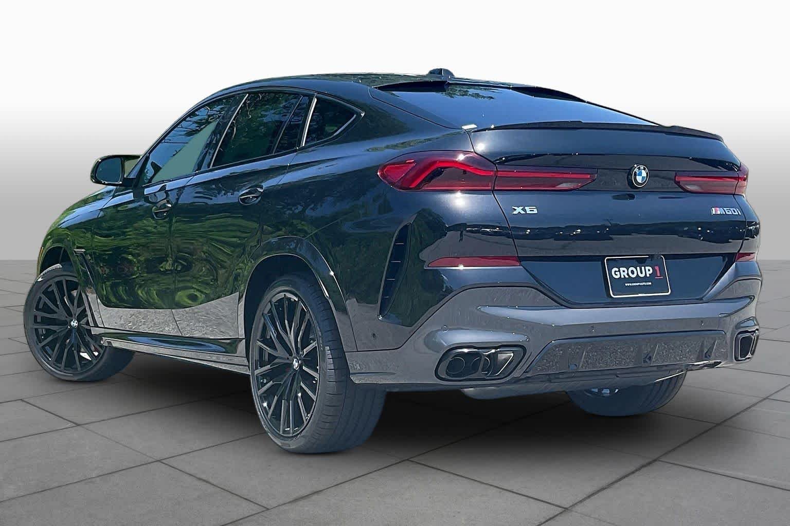 Used 2027 Black Sapphire Metallic BMW M60i image 12