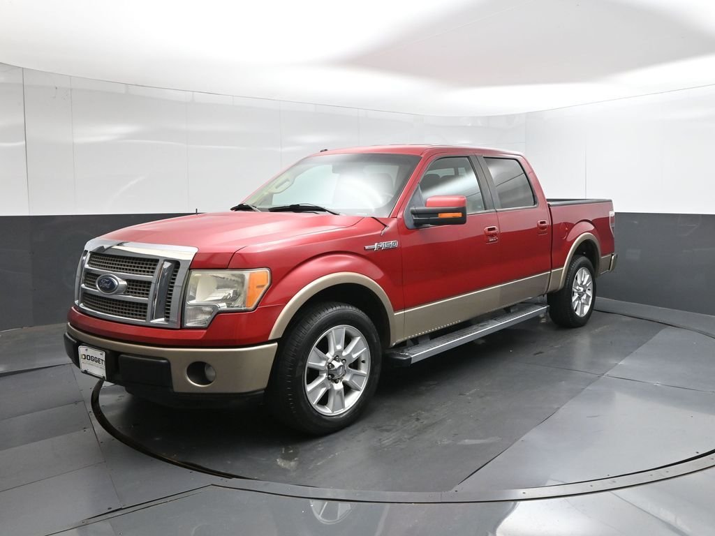 Used 2012 Red Ford Lariat image 1