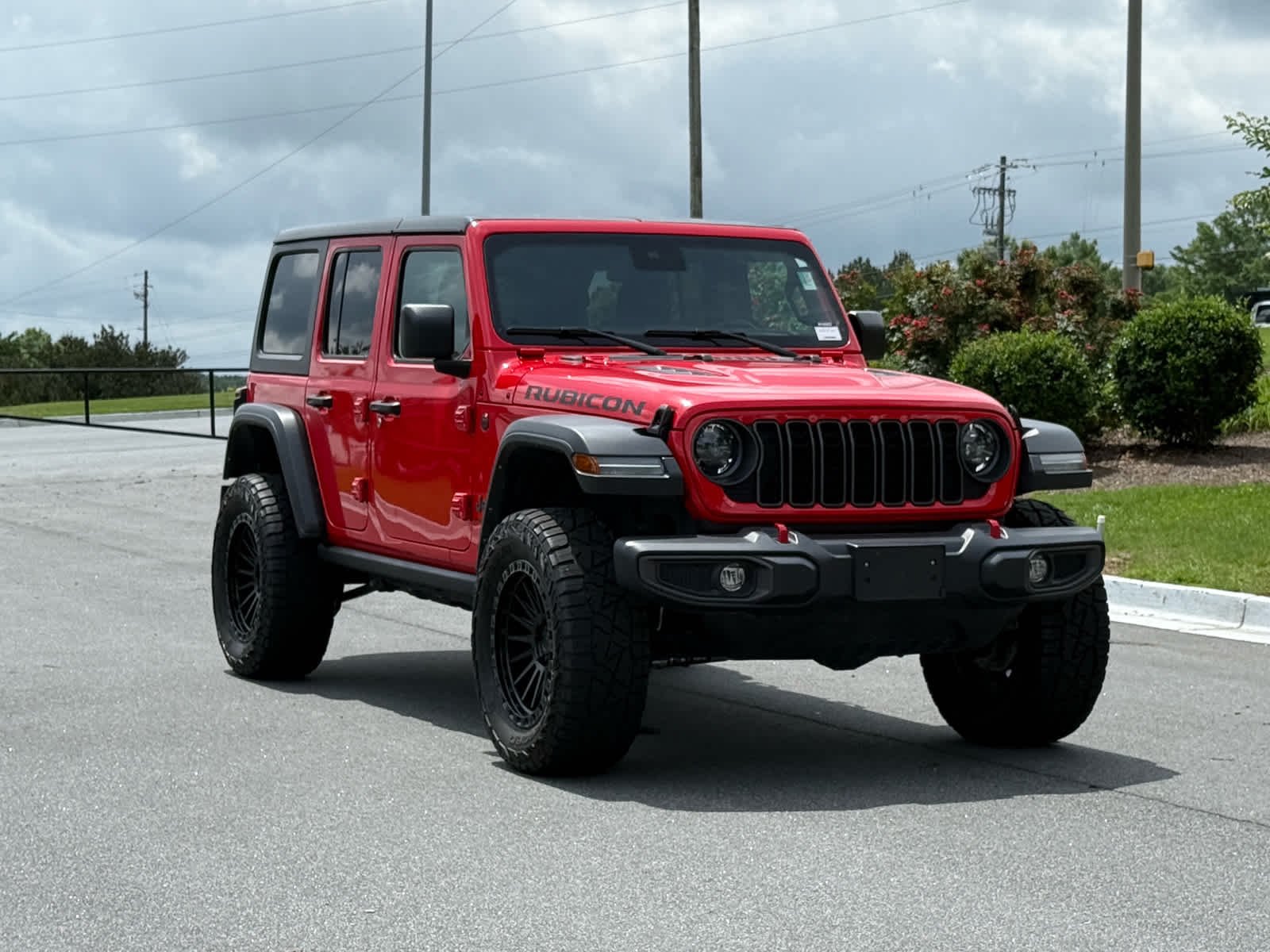 Used 2024 Firecracker Red Clearcoat Jeep Rubicon image 7