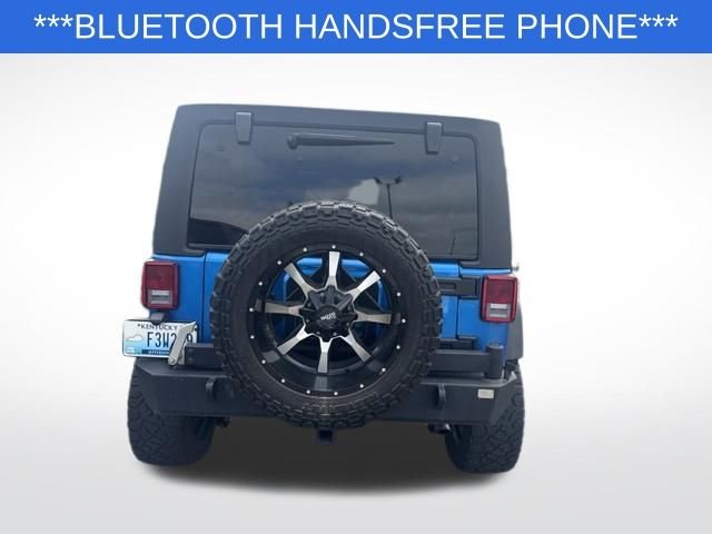 Used 2015 Blue Jeep Unlimited Sport image 3