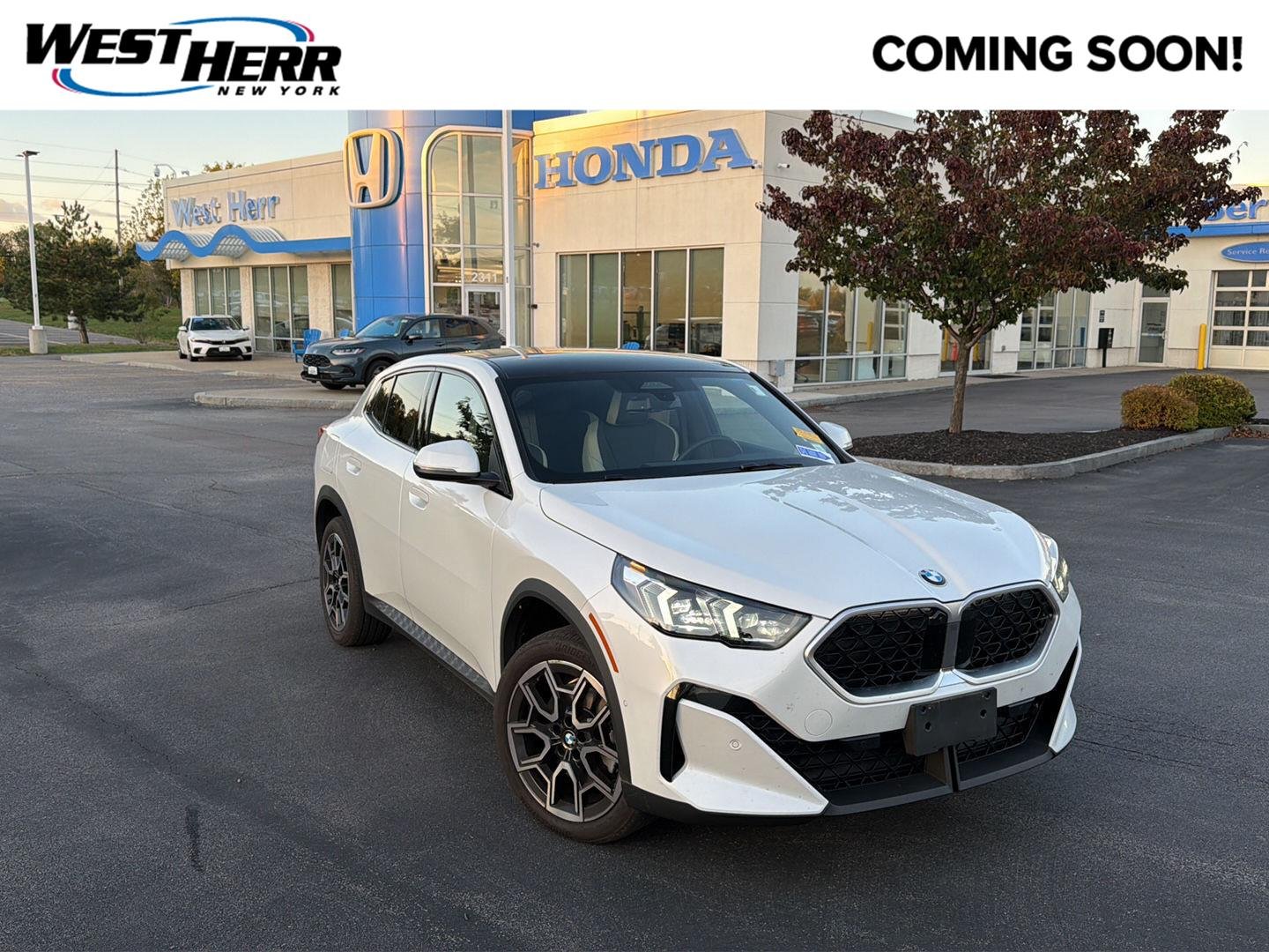Used 2025 Mineral White Metallic BMW xDrive28i image 1