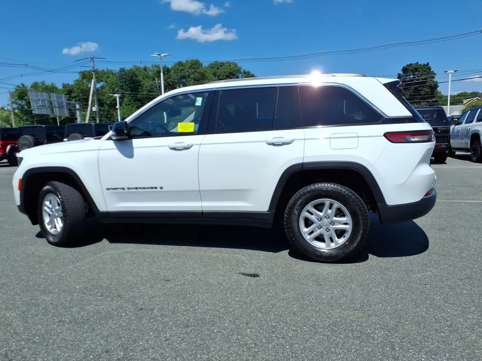 Certified Used 2023 Bright White Clearcoat Jeep Laredo image 12