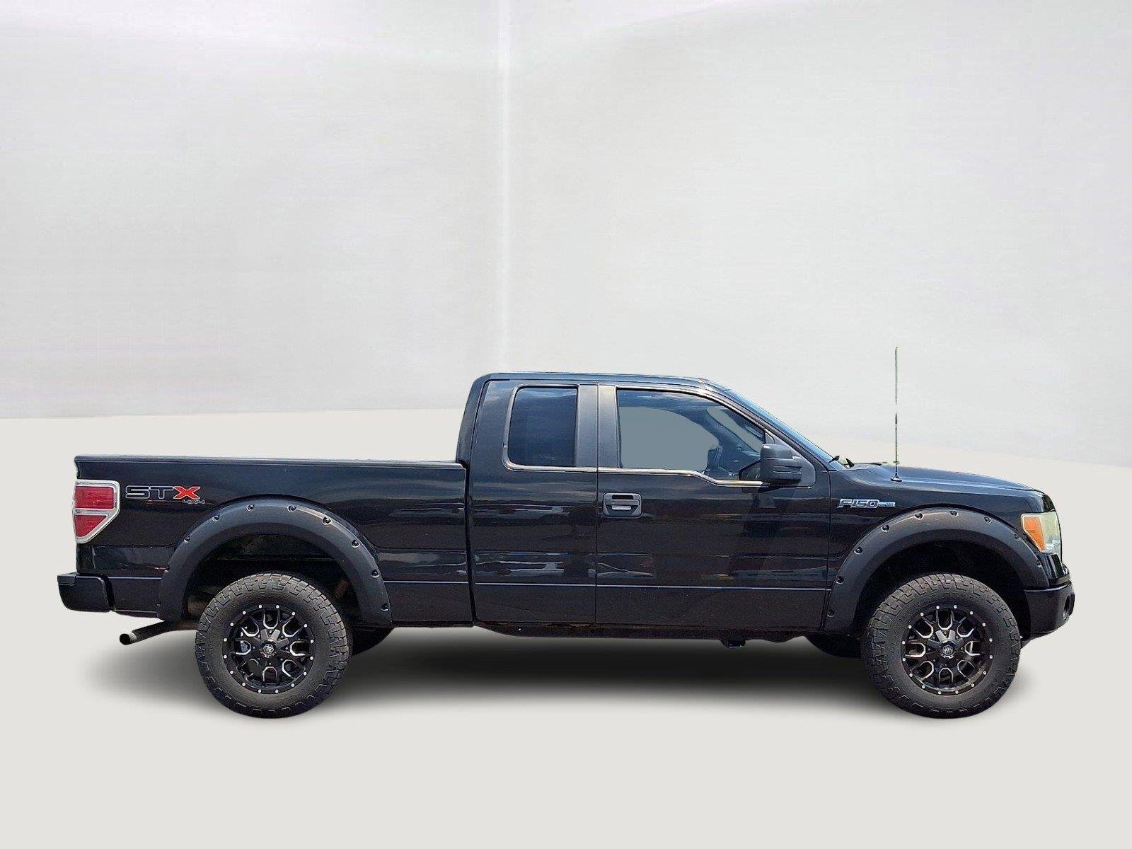 Used 2013 Tuxedo Black Metallic Ford STX image 7
