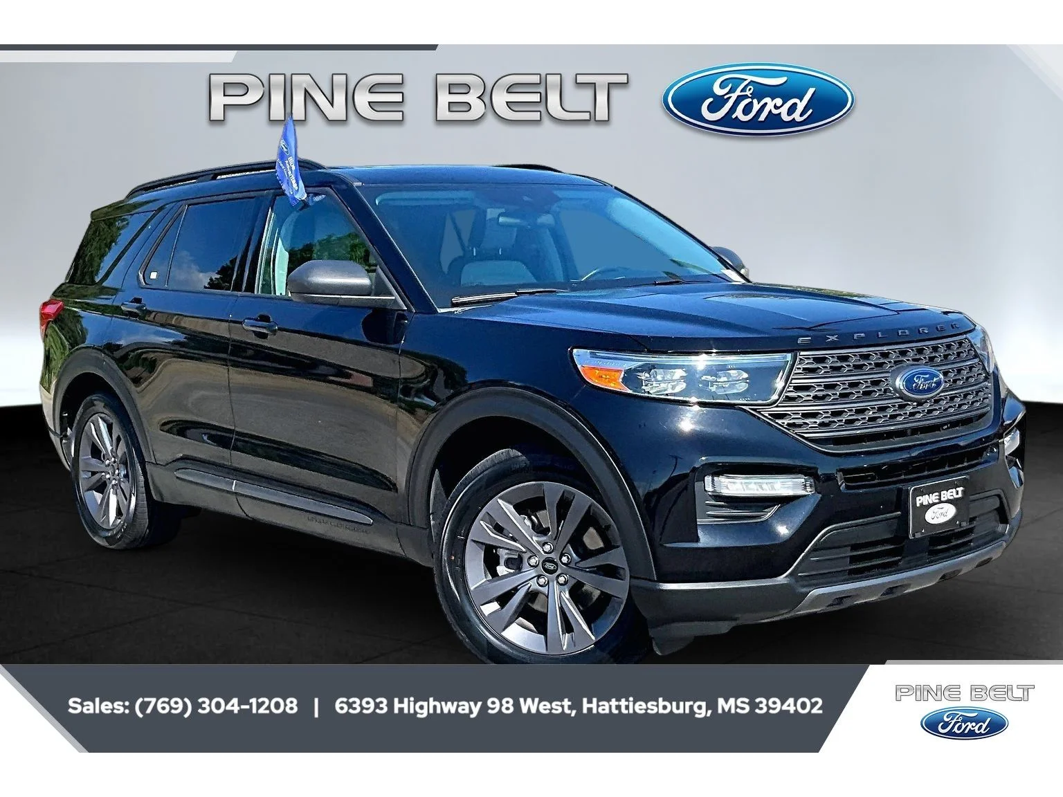 Used 2021 Agate Black Metallic Ford XLT image 1
