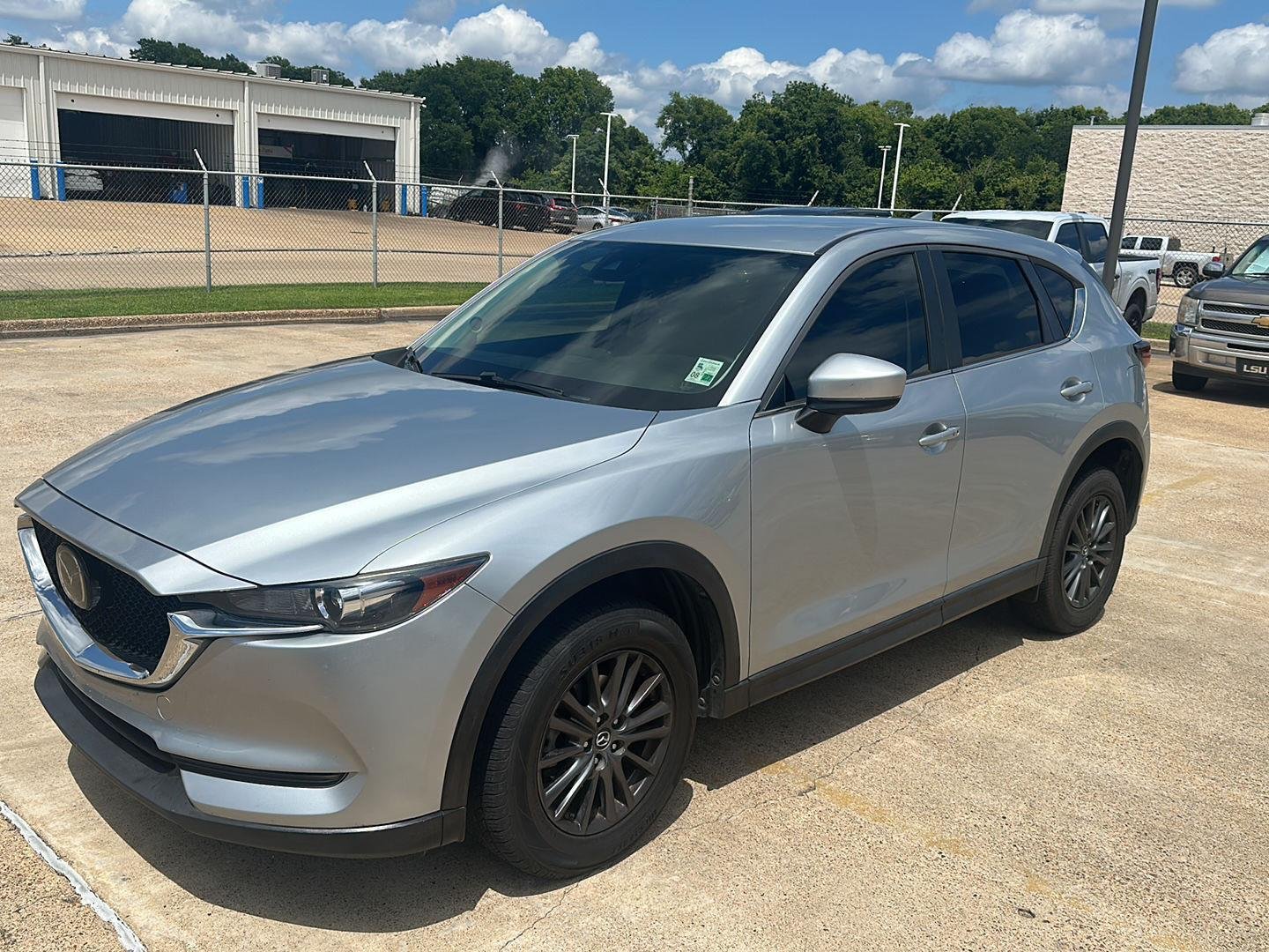 Used 2020 MACHINE GRAY METALLIC MAZDA TOUR image 1