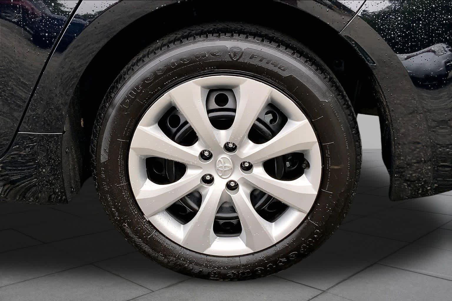 Used 2025 Midnight Black Metallic Toyota LE image 11