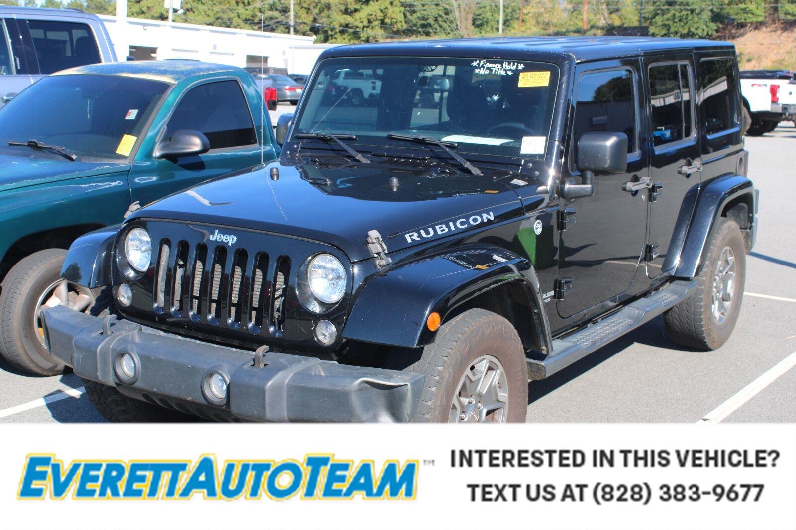 Used 2016 Black Clearcoat Jeep Rubicon image 1