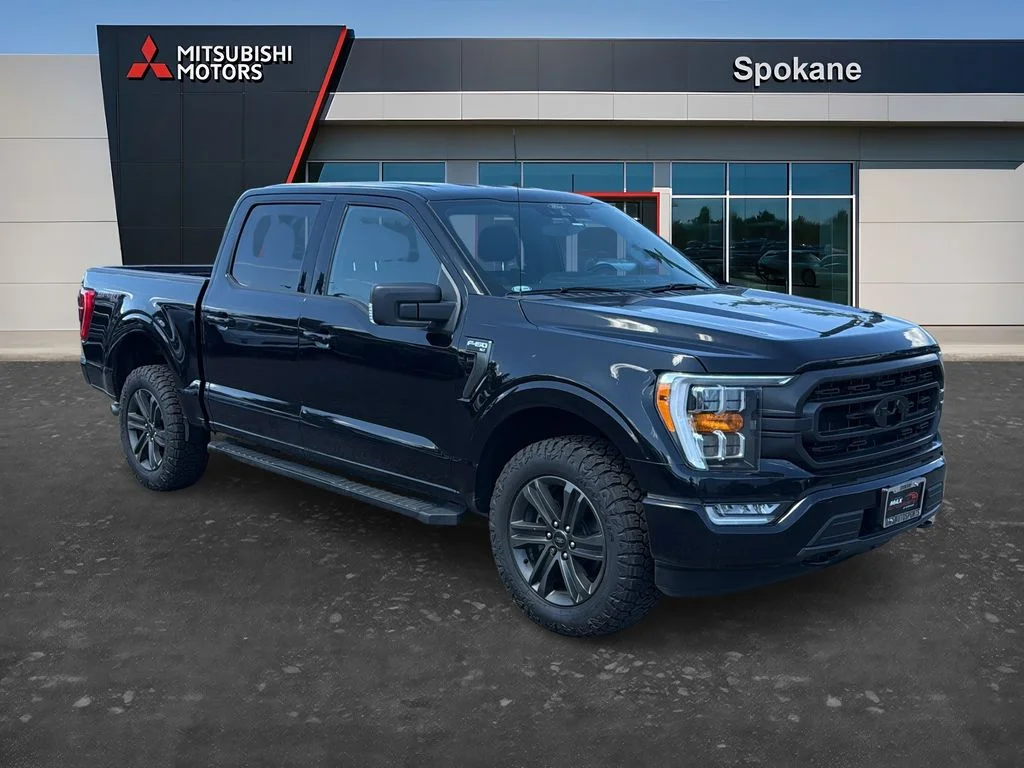 Used 2021 Agate Black Metallic Ford XLT image 1