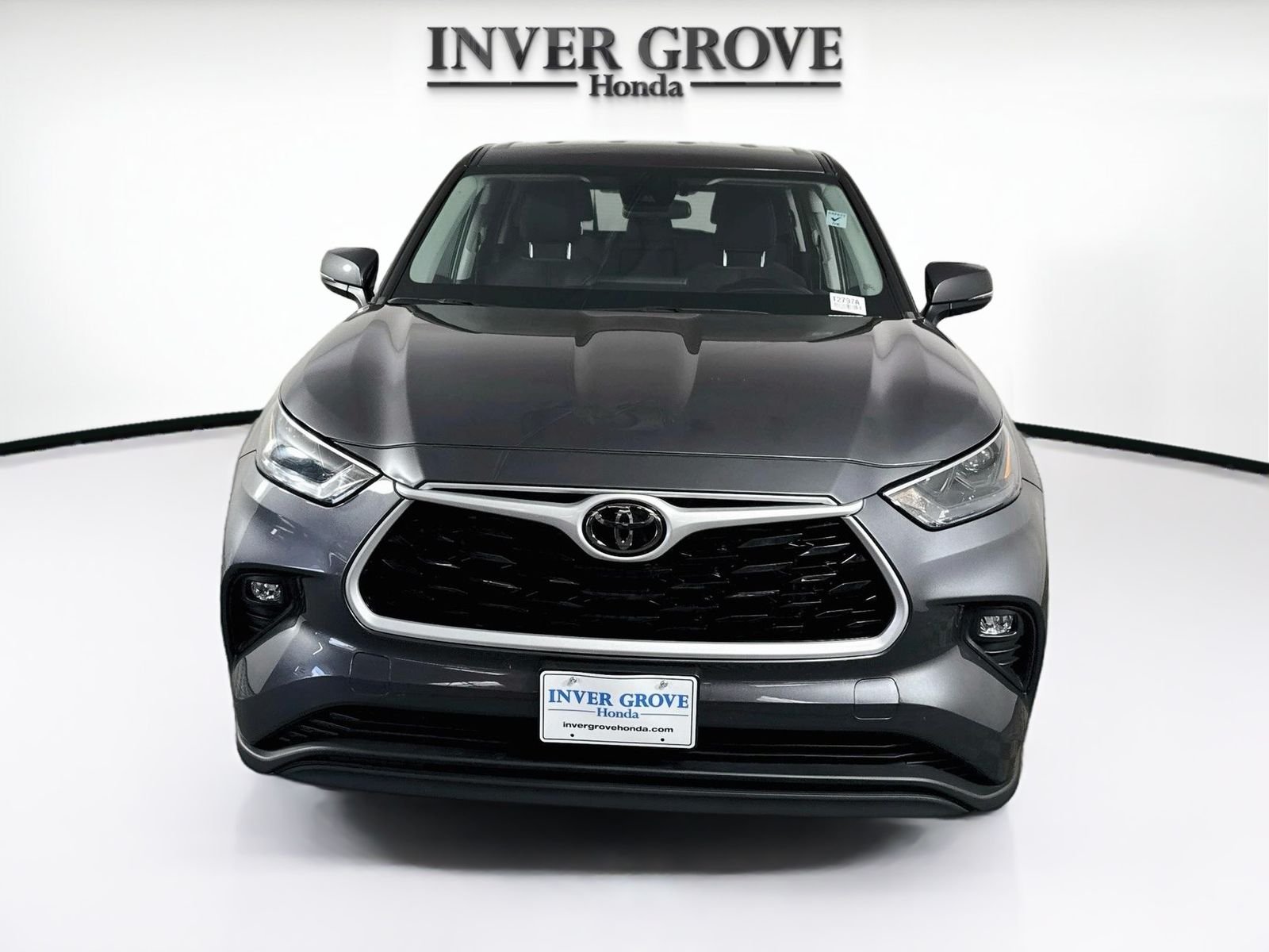 Used 2023 Toyota Highlander LE with VIN 5TDKDRBHXPS009235 for sale in Inver Grove Heights, Minnesota