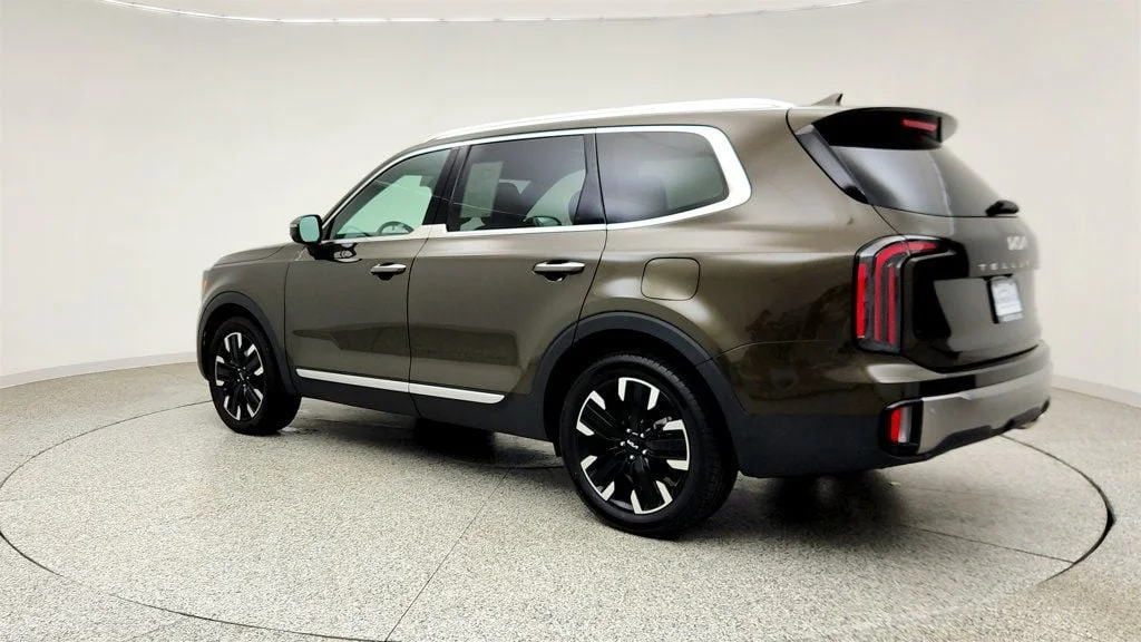 Used 2025 Dark Moss Kia SX AWD w/ Captain