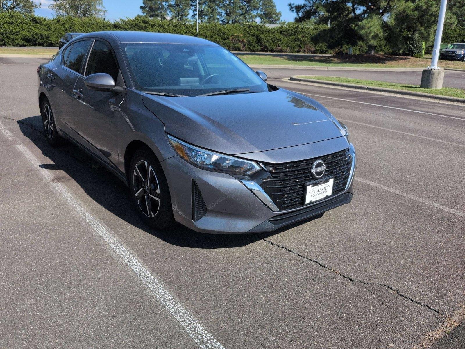 Used 2024 Gun Metallic Nissan SV image 1