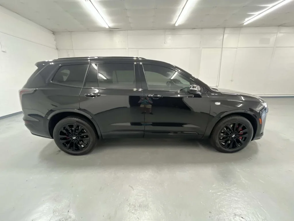 Used 2023 Stellar Black Metallic Cadillac Sport image 2