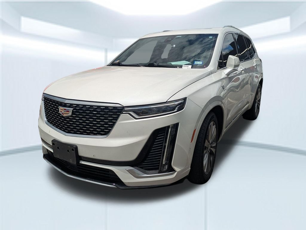 Used 2022 White Cadillac Premium Luxury image 1