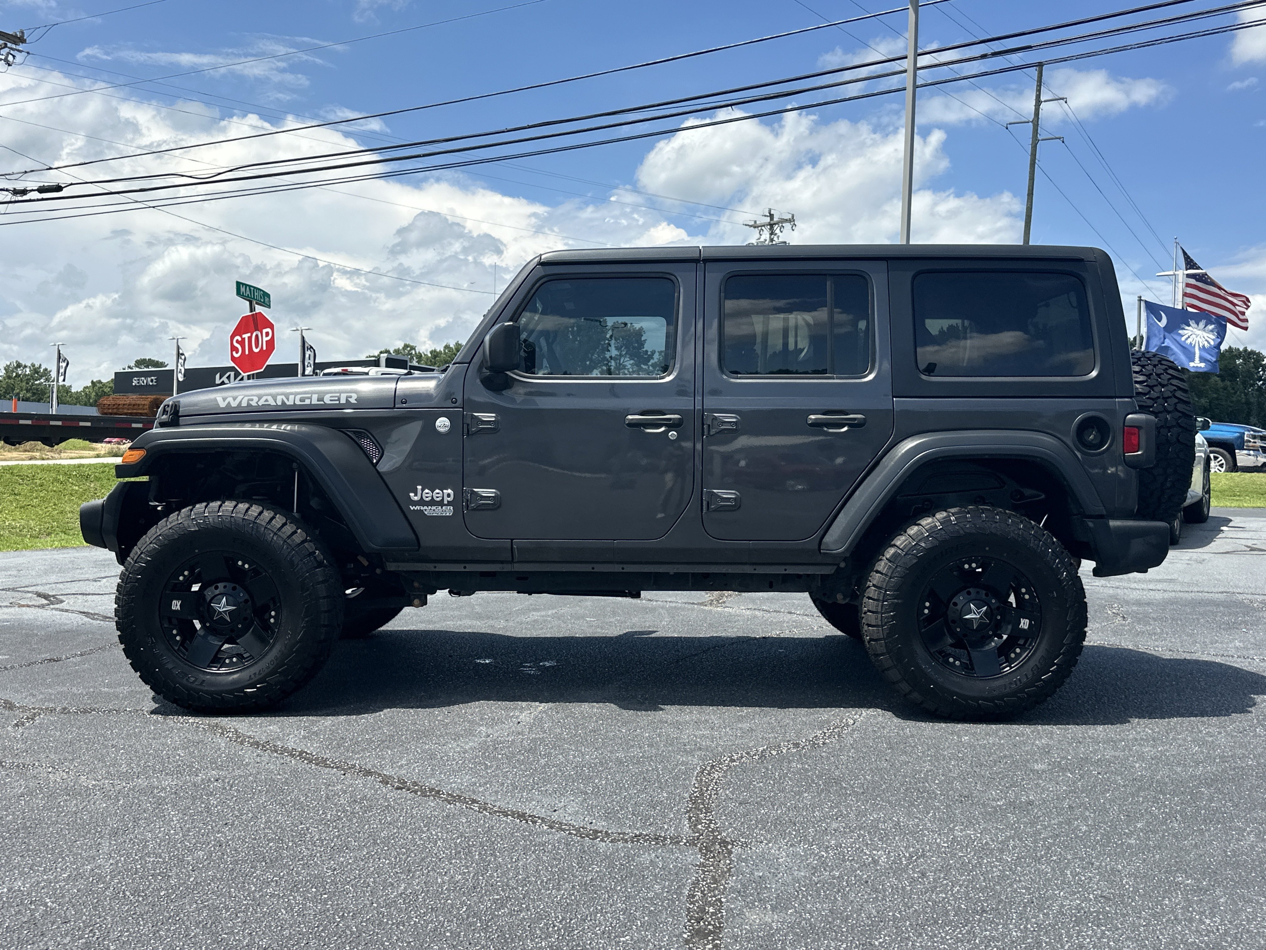 Used 2020 Granite Crystal Metallic Clearcoat Jeep Sport S image 5