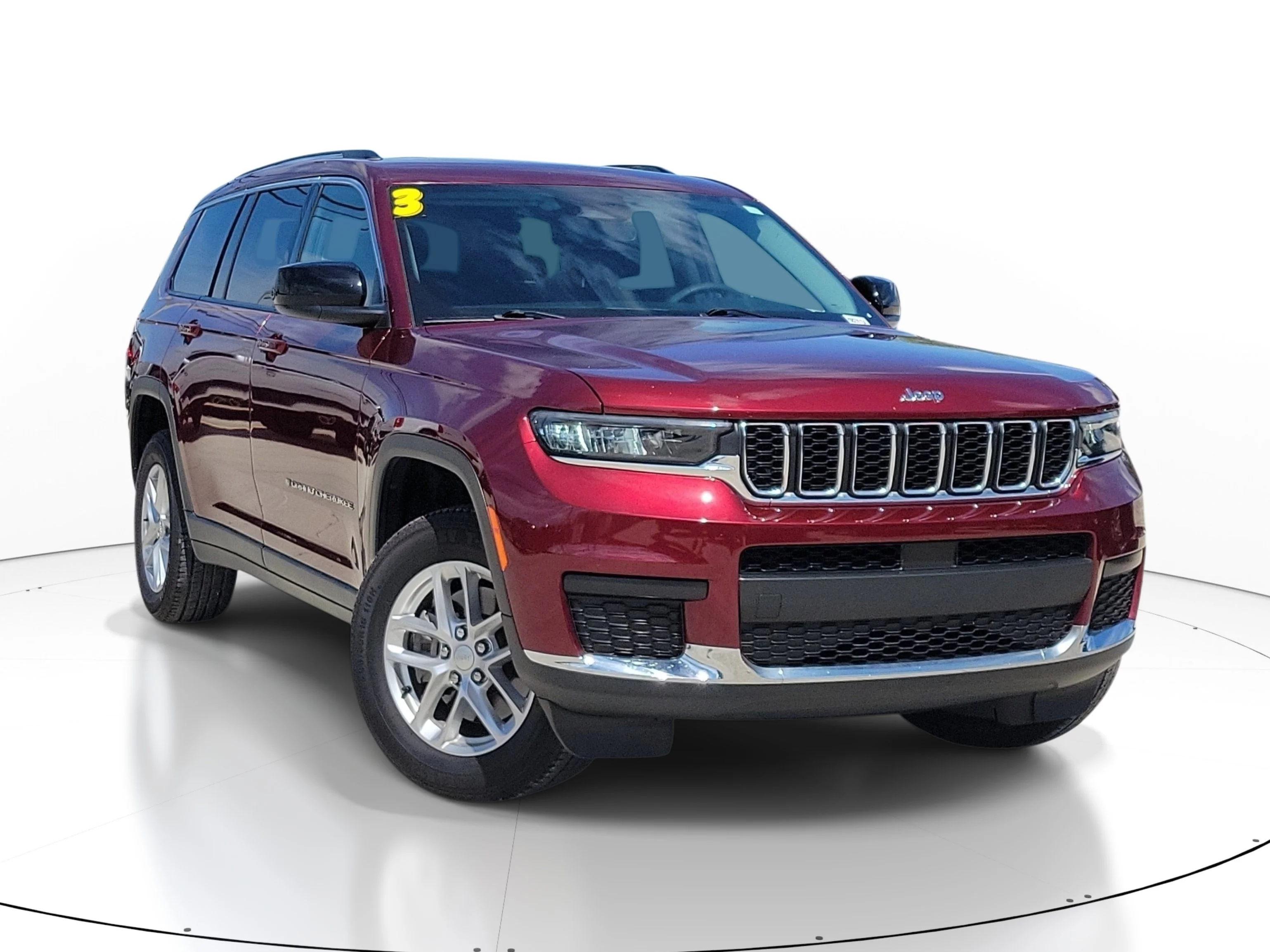 Used 2023 Velvet Red Pearlcoat Jeep Laredo image 1