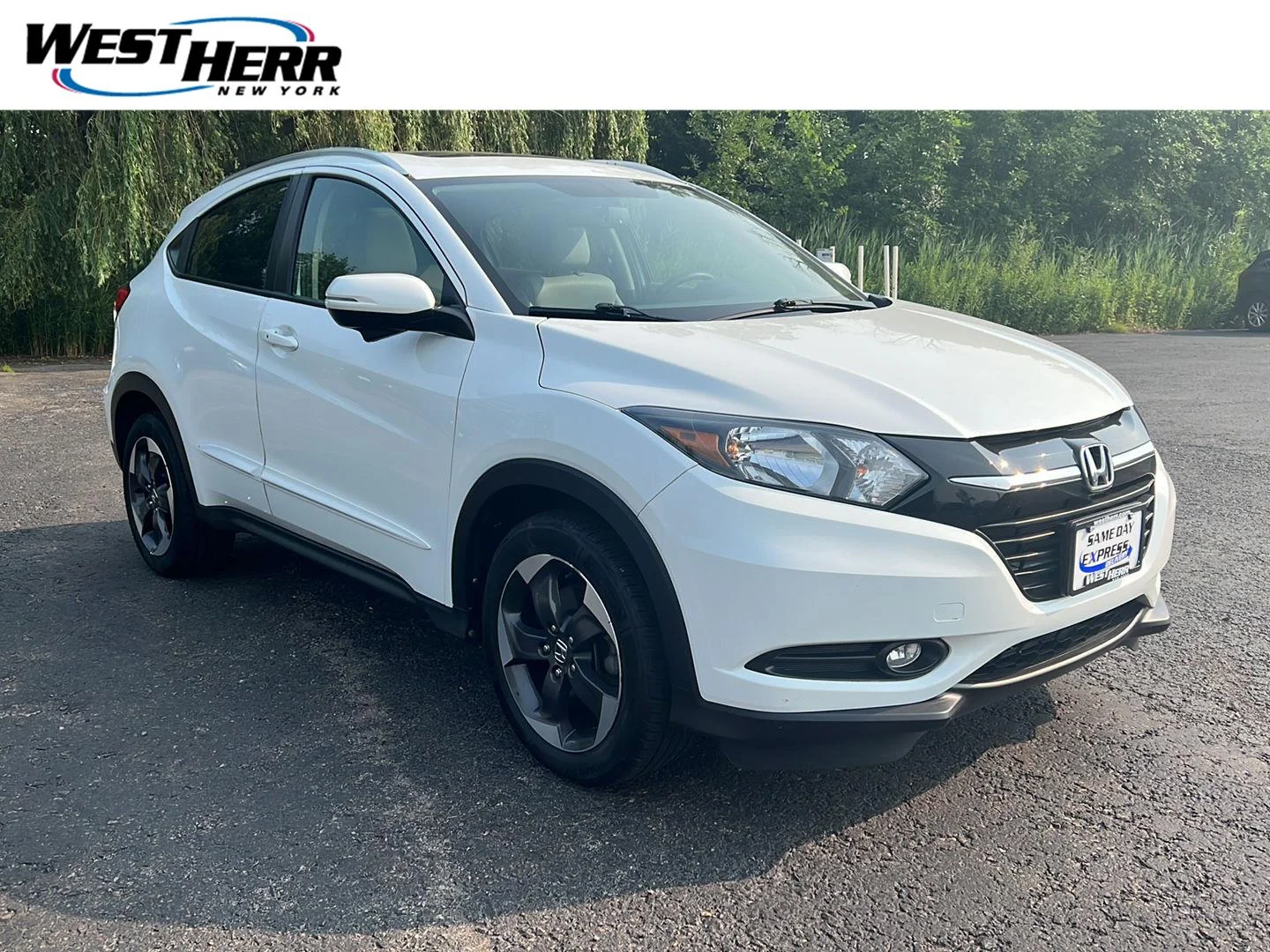 Used 2018 White Orchid Pearl Honda EX-L Navi image 1