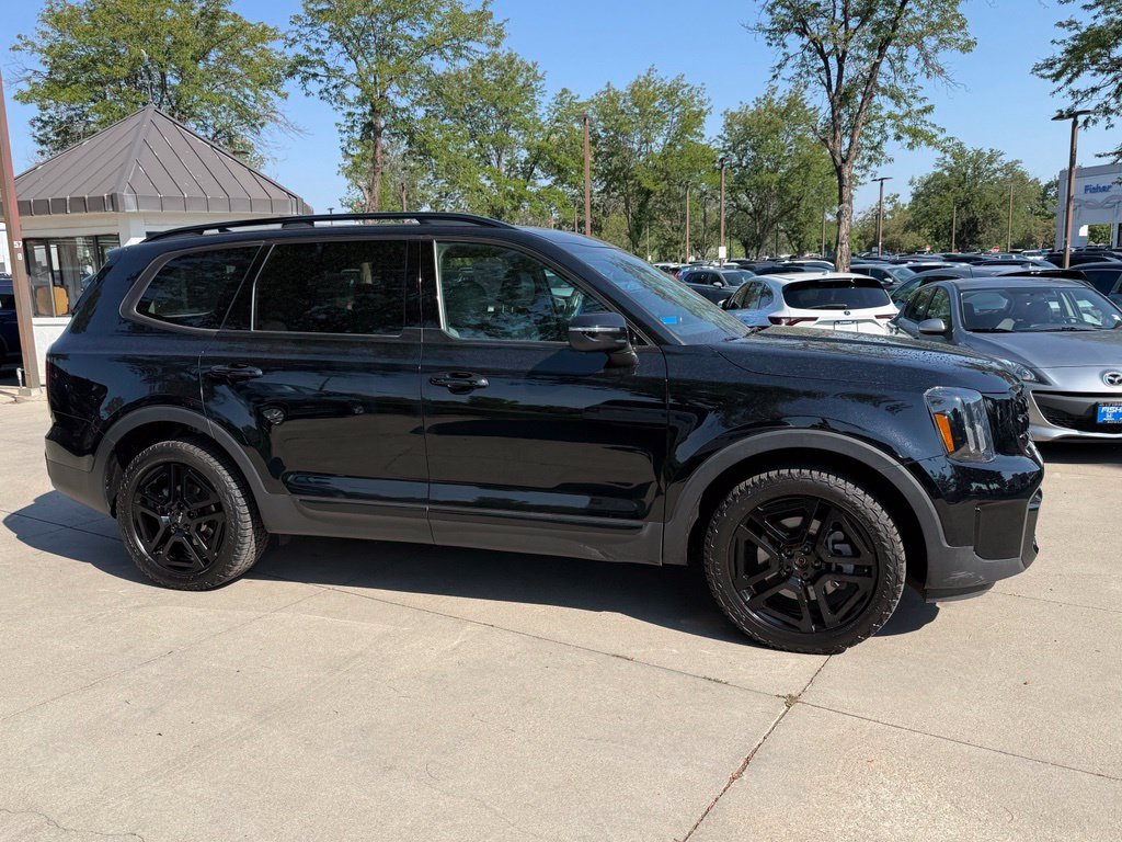 Used 2024 Ebony Black Kia EX X-Line image 3