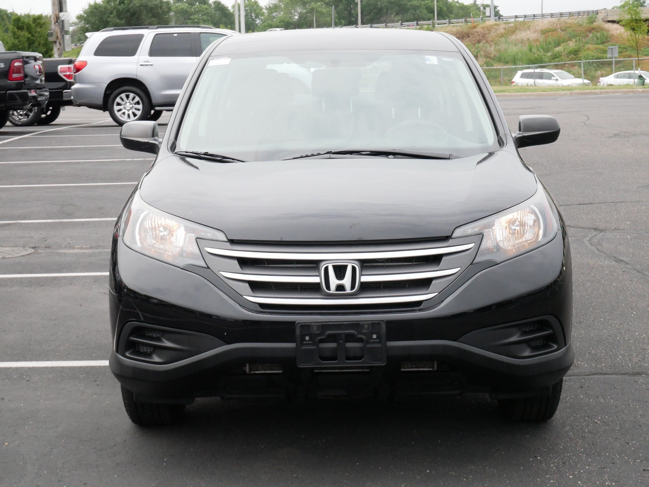 Used 2014 Honda CR-V LX with VIN 2HKRM4H32EH664599 for sale in Brooklyn Center, Minnesota