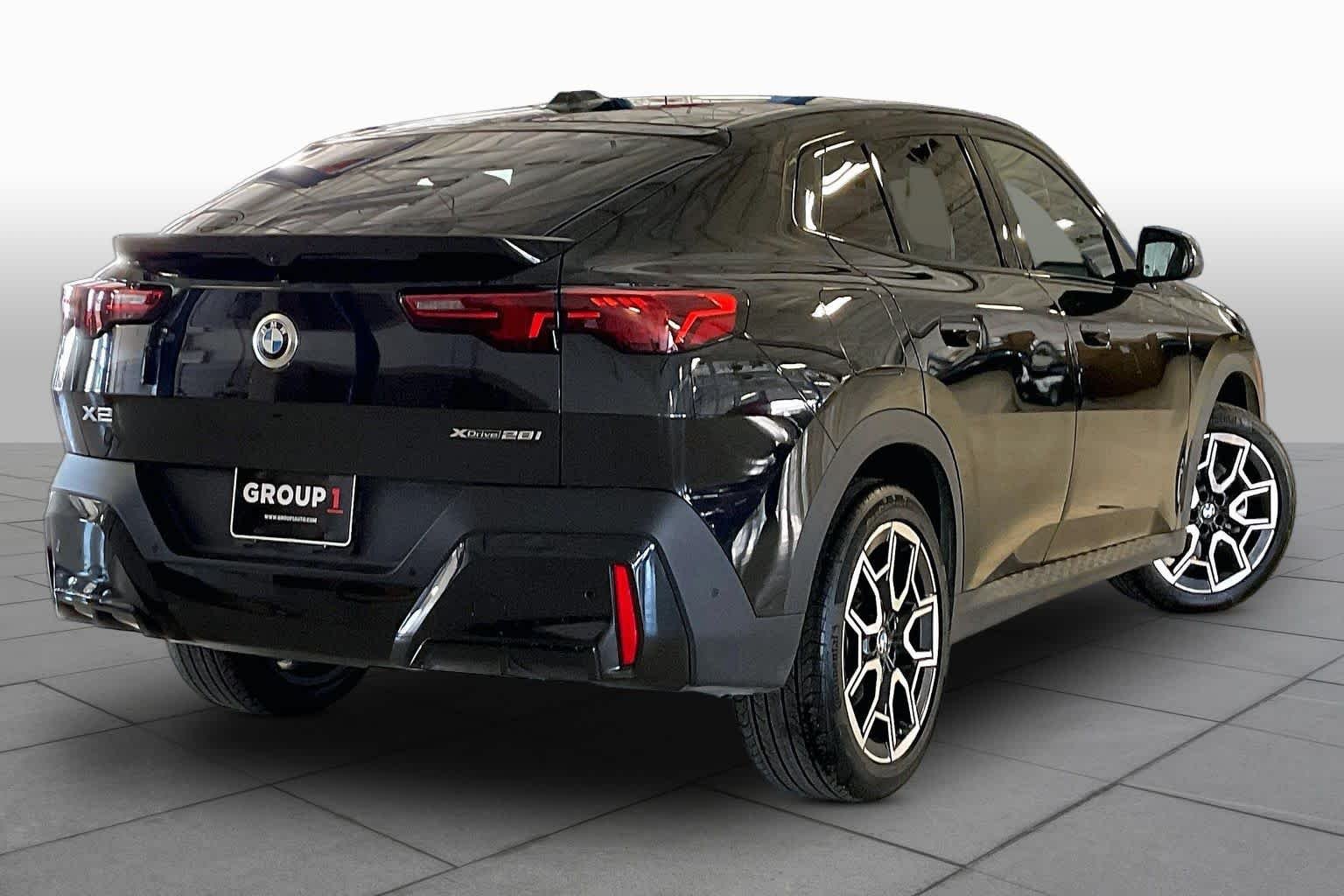 Used 2026 Black Sapphire Metallic BMW xDrive28i image 12