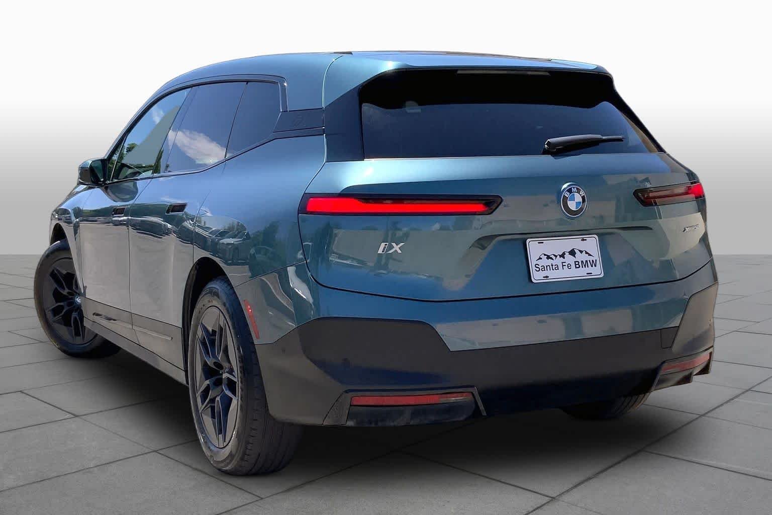 Used 2024 Blue Ridge Mountain Metallic BMW xDrive50 image 11