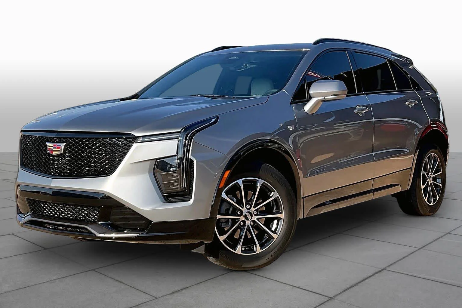 Used 2024 Argent Silver Metallic Cadillac FWD Sport image 2