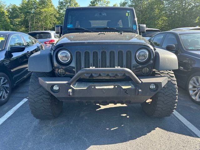Used 2016 Black Jeep Unlimited Sport image 2