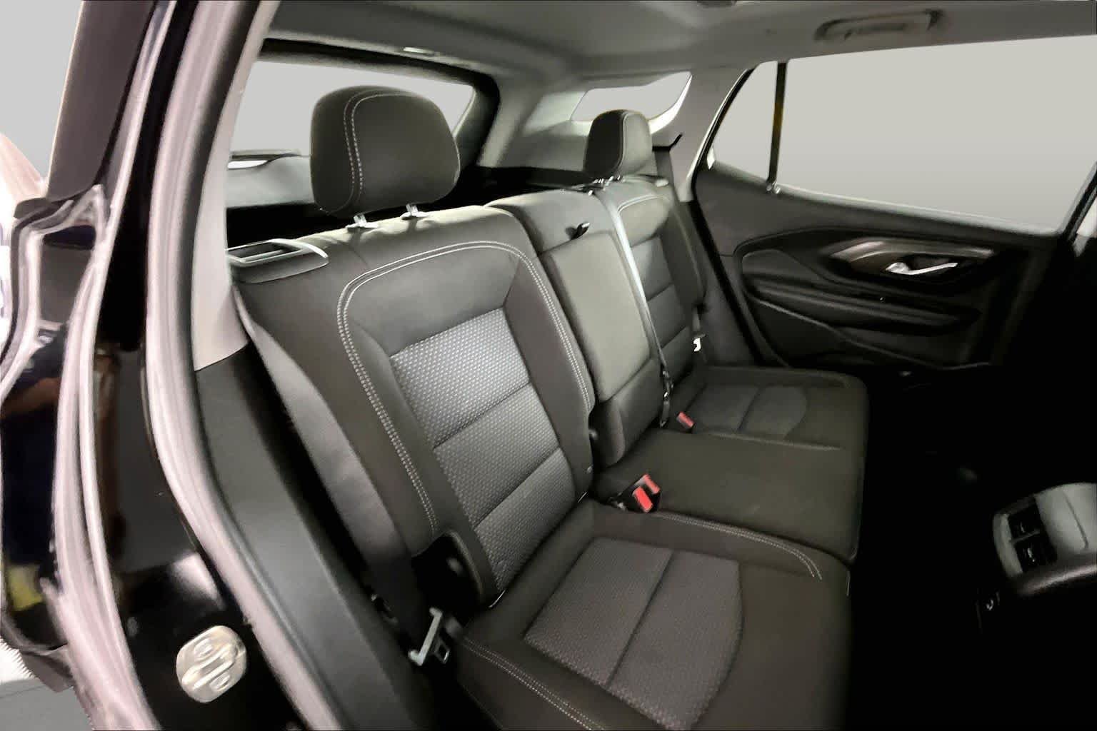 Used 2024 Ebony Twilight Metallic GMC SLE image 19