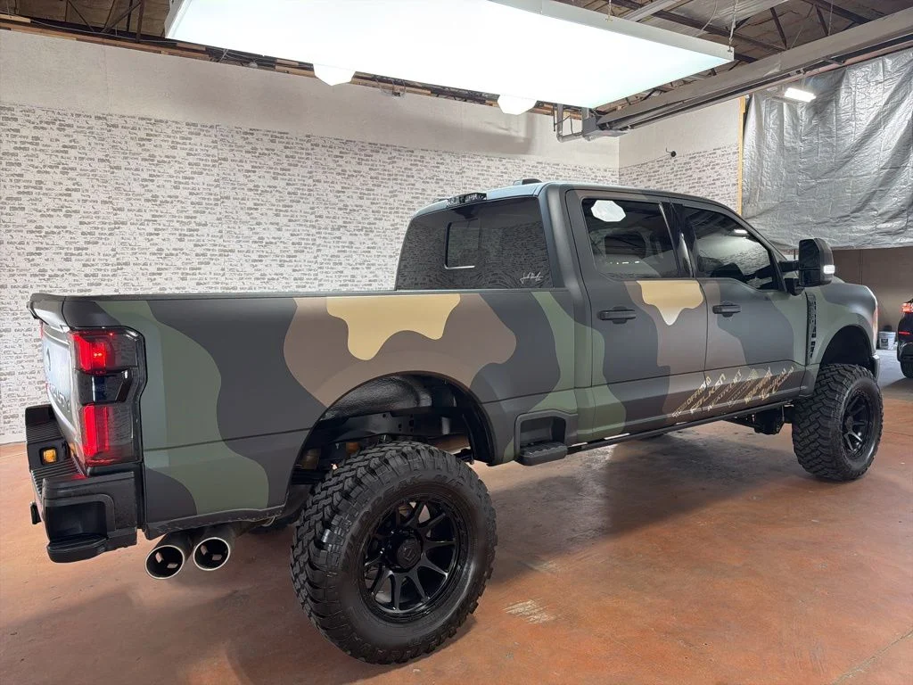 Used 2023 White Metallic / Camo Wrap Ford Lariat image 7