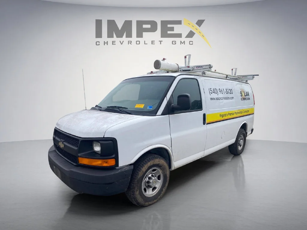 Used 2014 White Chevrolet Work Van image 1