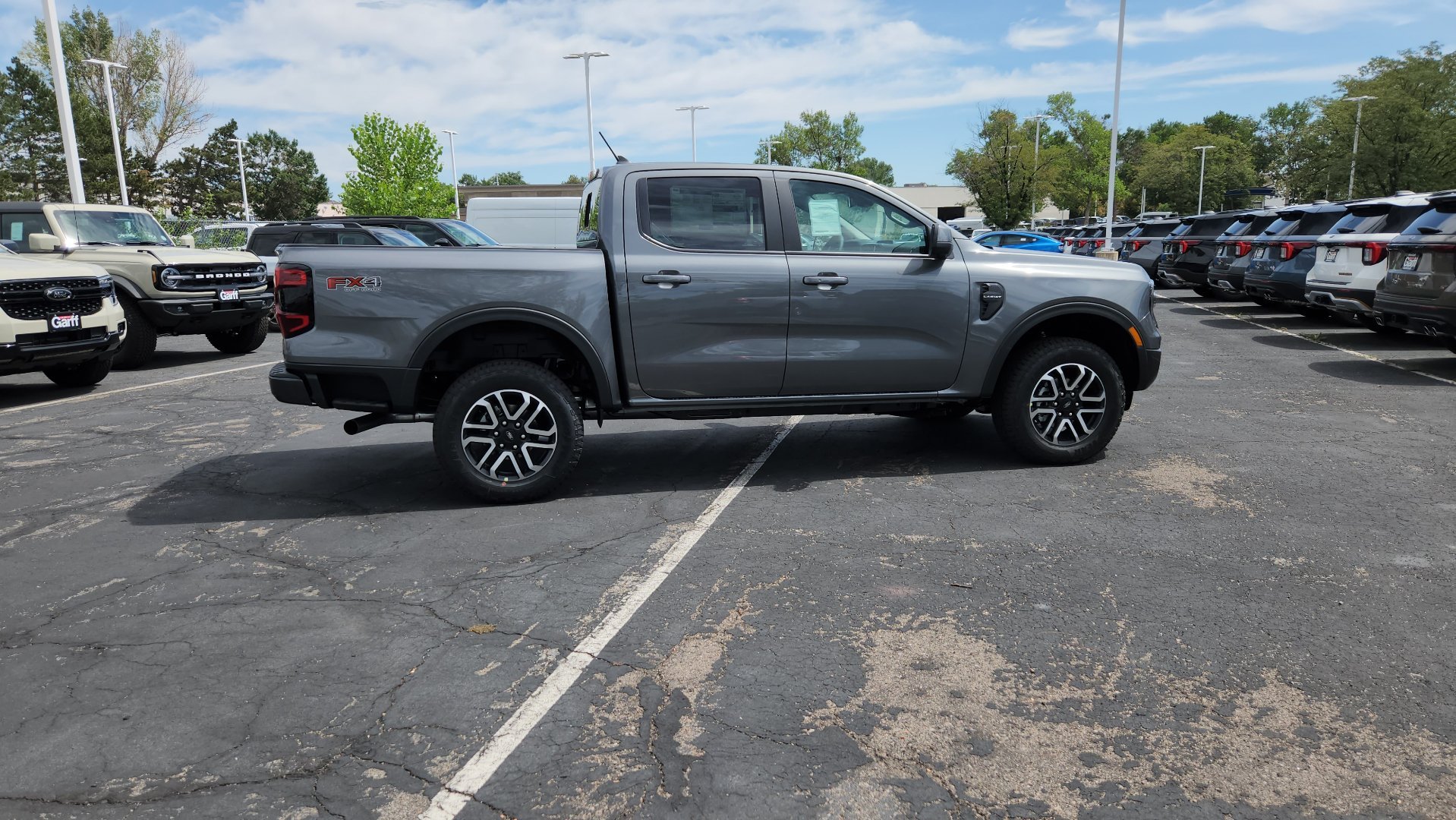 New 2026 Carbonized Gray Metallic Ford LARIAT image 8