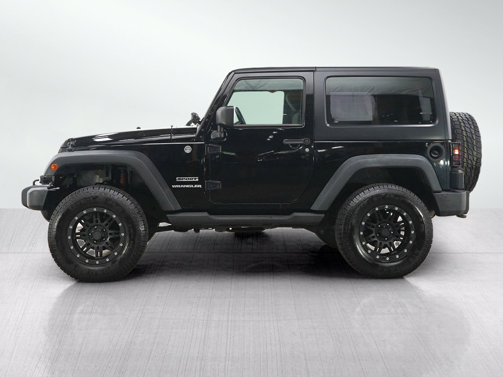 Used 2012 Jeep Wrangler Sport with VIN 1C4AJWAG1CL138410 for sale in Burnsville, Minnesota
