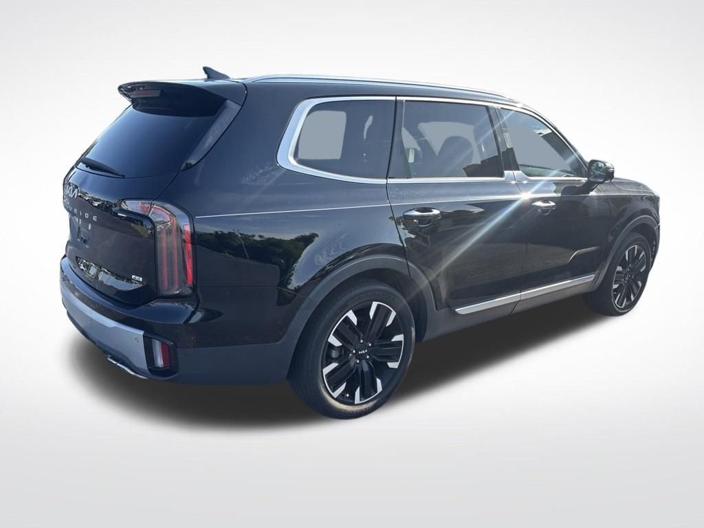 Used 2023 Black Kia SX-Prestige image 11