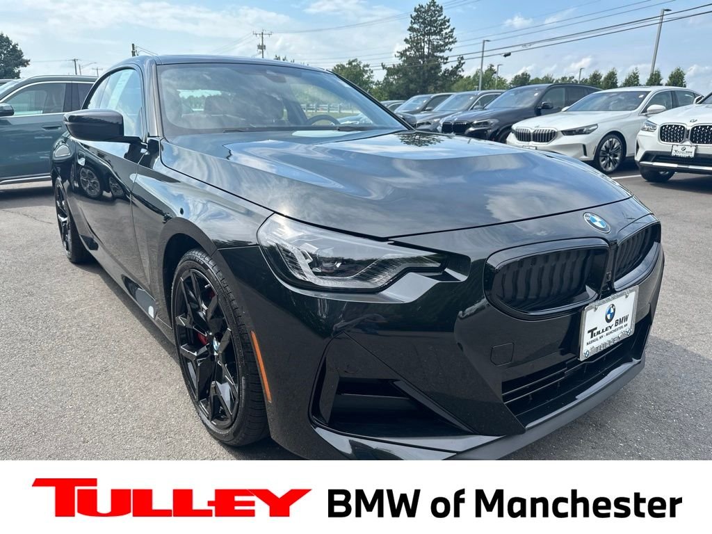 Used 2026 Black Sapphire Metallic BMW 230i xDrive image 1