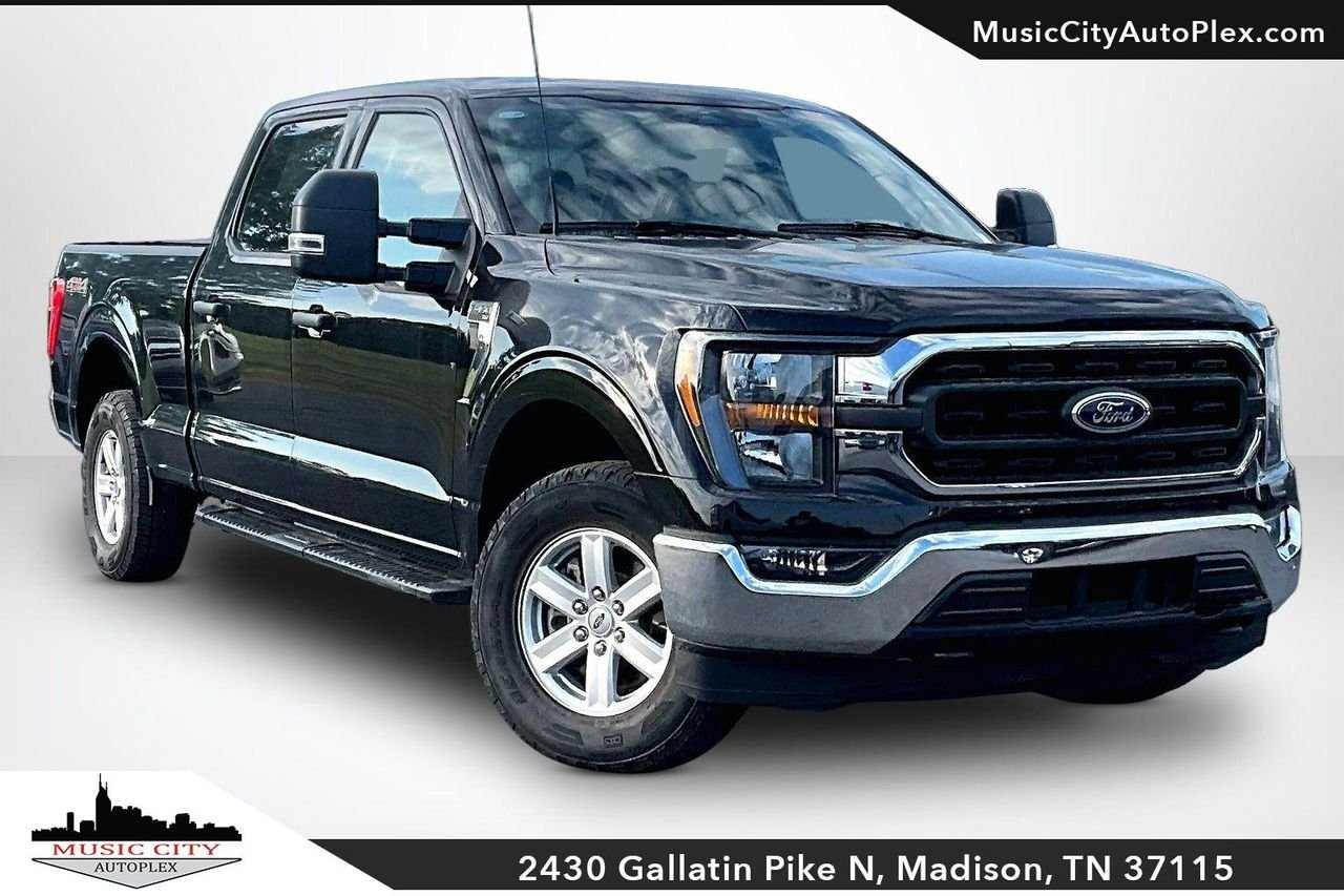 Used 2023 AGATE BLACK METALLIC Ford XLT image 1