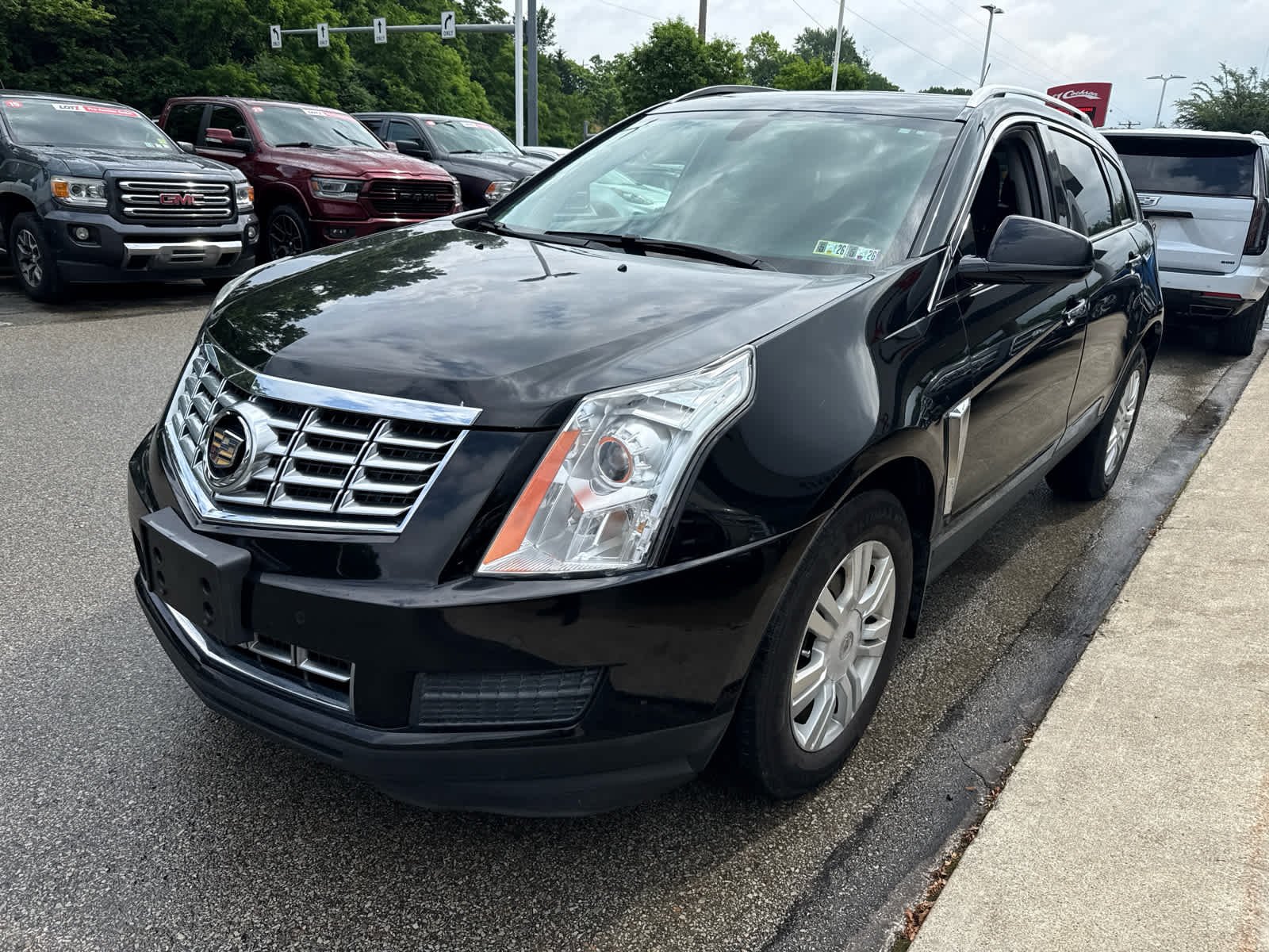 Used 2015 Black Raven Cadillac Luxury Collection image 1
