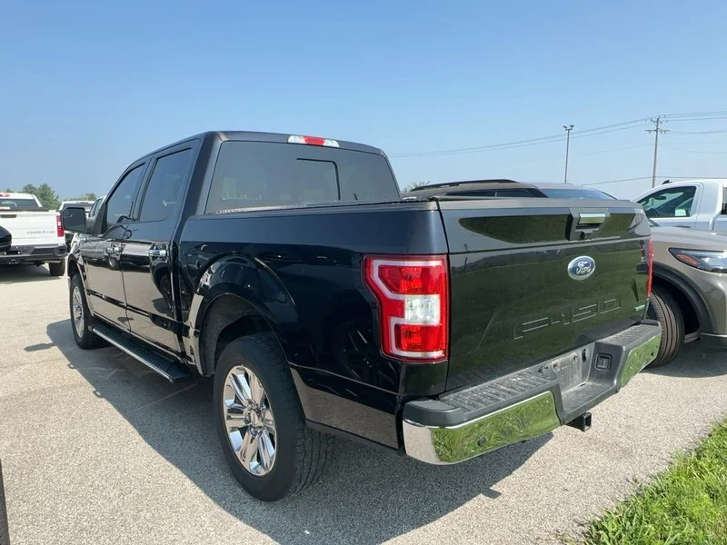 Used 2020 Agate Black Metallic Ford XLT 4WD SuperCrew 5.5