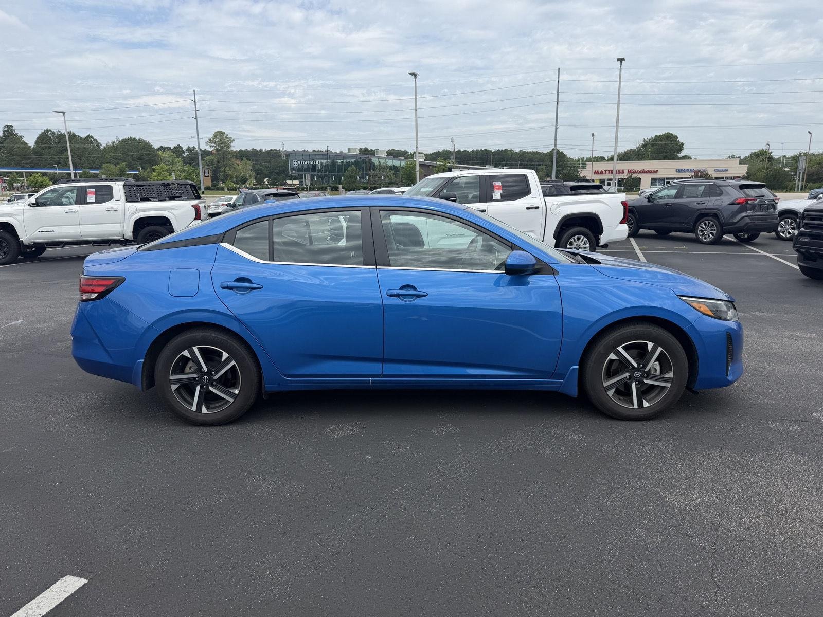 Used 2025 Electric Blue Metallic Nissan SV image 8