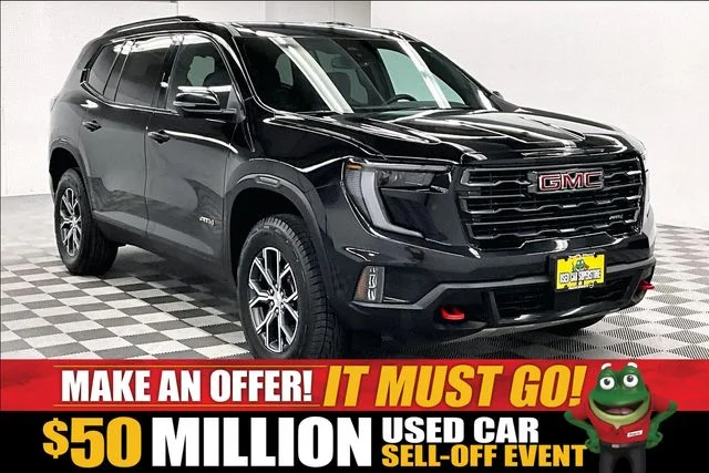 Used 2025 Ebony Twilight Metallic GMC AT4 image 1