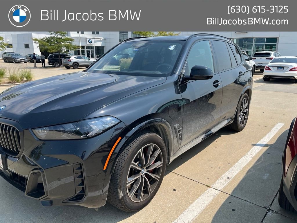 Certified Used 2026 Black Sapphire Metallic BMW xDrive50e image 1