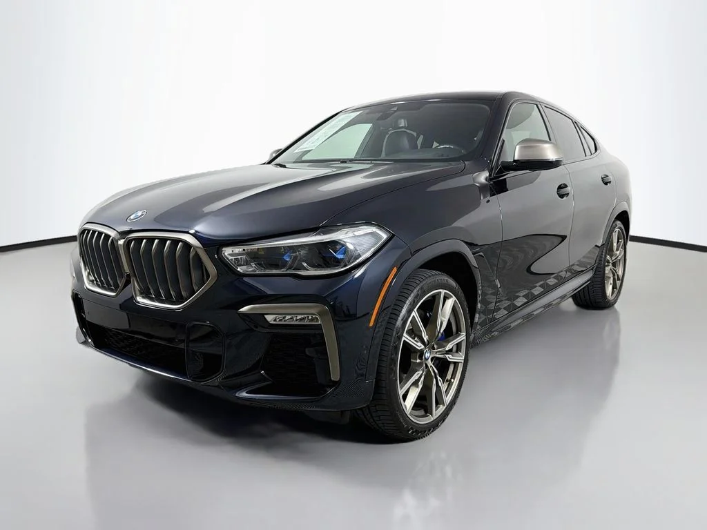 Used 2020 Carbon Black Metallic BMW M50i image 1