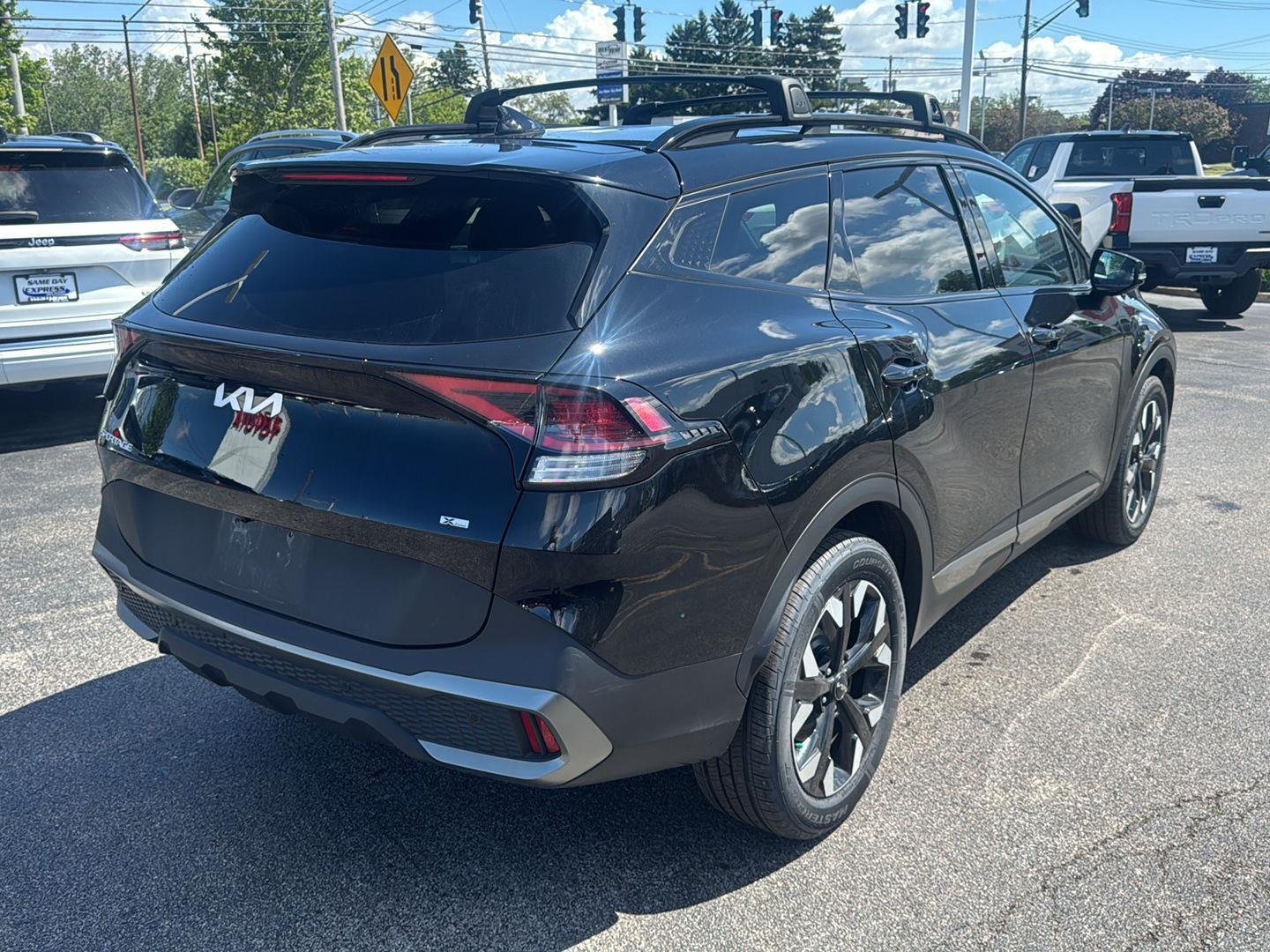 Used 2024 Ebony Black Kia X-Line image 6