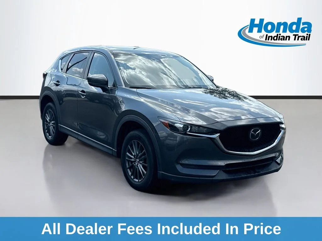 Used 2019 Machine Gray Mazda Touring image 1