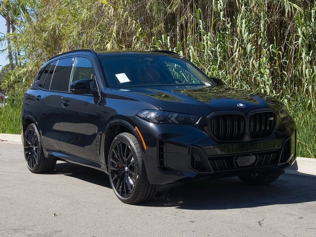 New 2026 Black Sapphire Metallic BMW M60i image 2