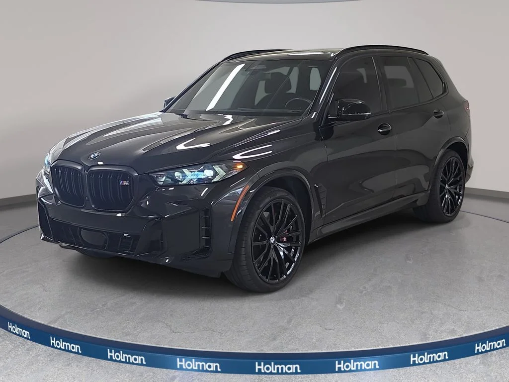 Used 2025 Black Sapphire Metallic BMW M60i image 1