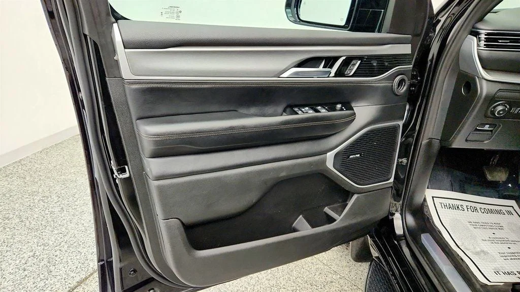 Used 2025 Diamond Black Crystal Pearlcoat Jeep Series II Carbide 4x4 w/ Rear Entertainment & 20