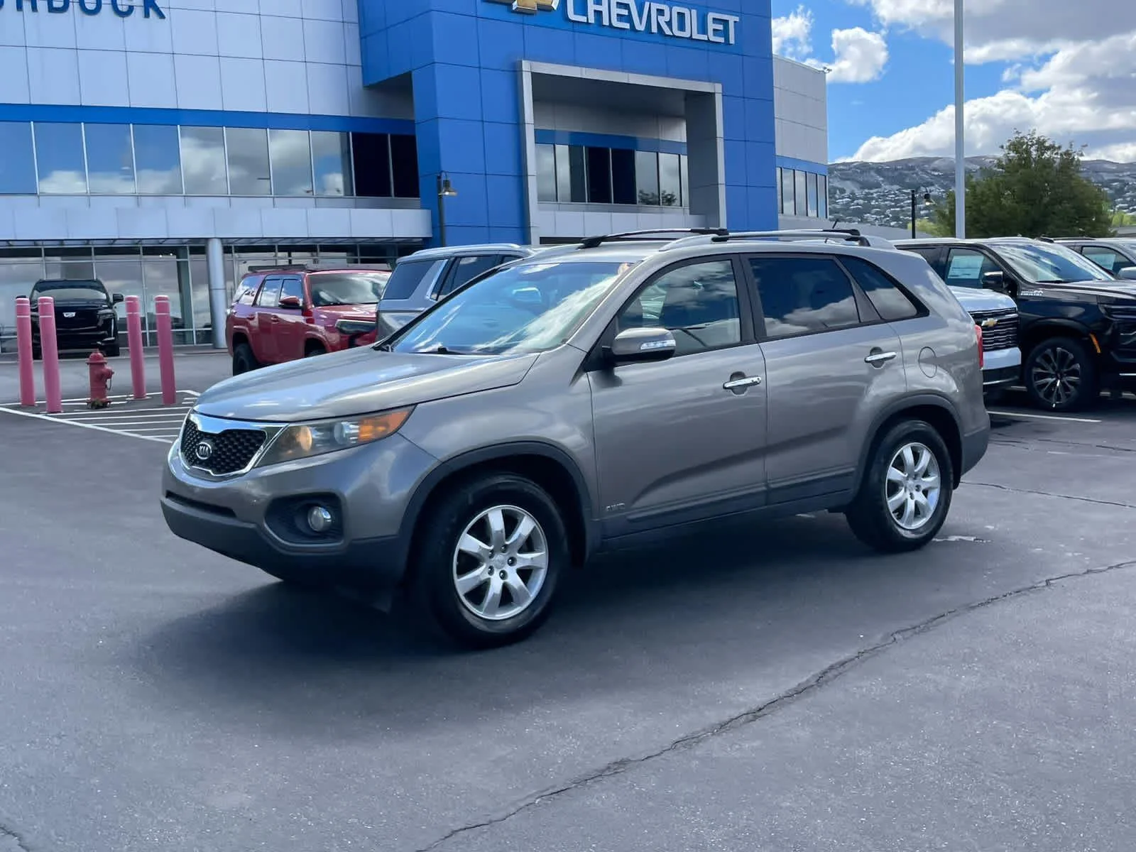 Used 2012 Kia Sorento EX with VIN 5XYKUCA69CG198030 for sale in Woods Cross, UT