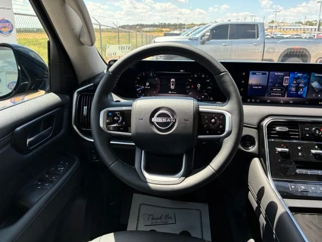 New 2026 Super Black Nissan SV image 14