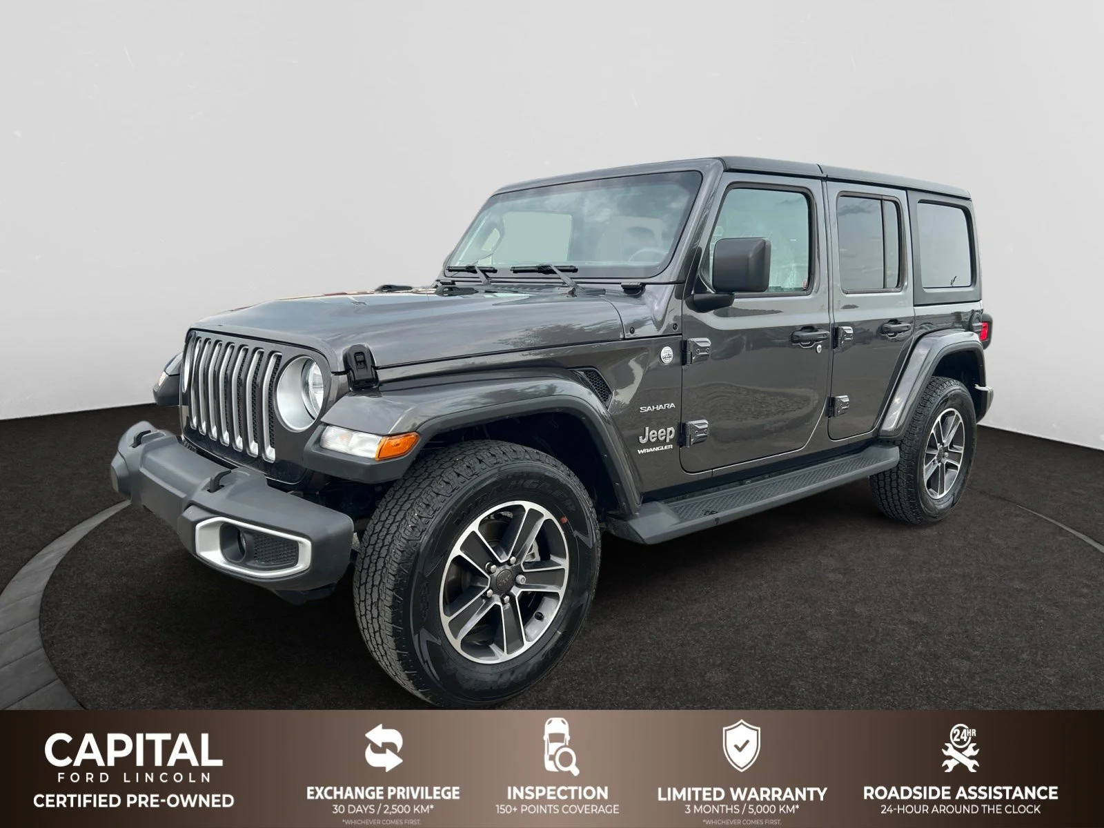 Used 2023 Granite Crystal Metallic Jeep SAHARA image 1