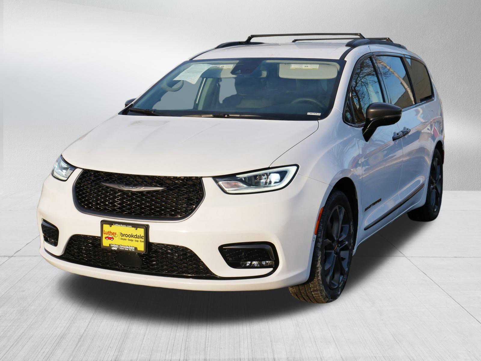 Certified 2024 Chrysler Pacifica Touring L with VIN 2C4RC1BGXRR102374 for sale in Brooklyn Park, Minnesota