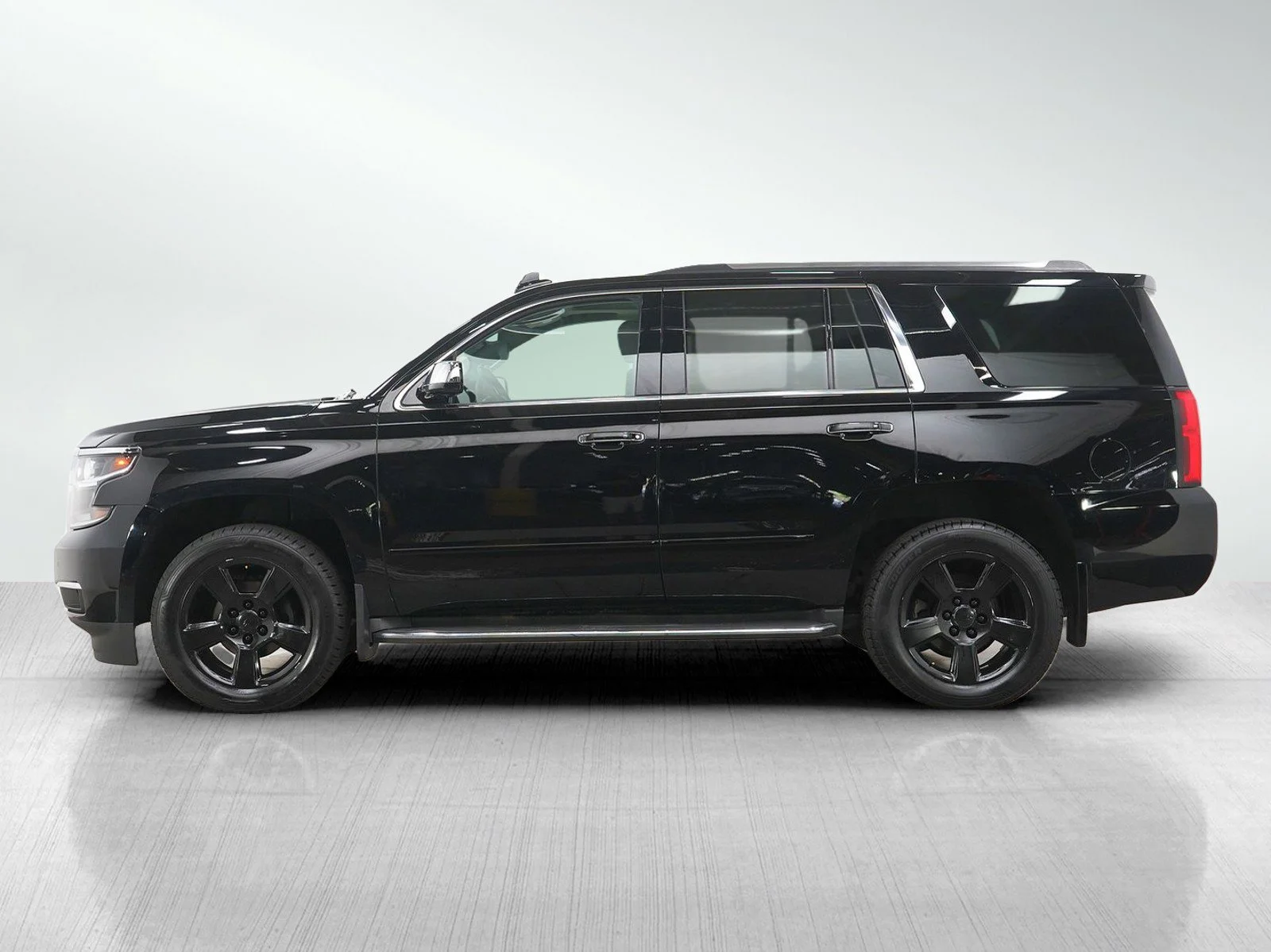 Used 2016 Chevrolet Tahoe LTZ with VIN 1GNSKCKC7GR144363 for sale in Roseville, Minnesota